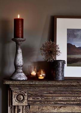 Warm candles on mantle