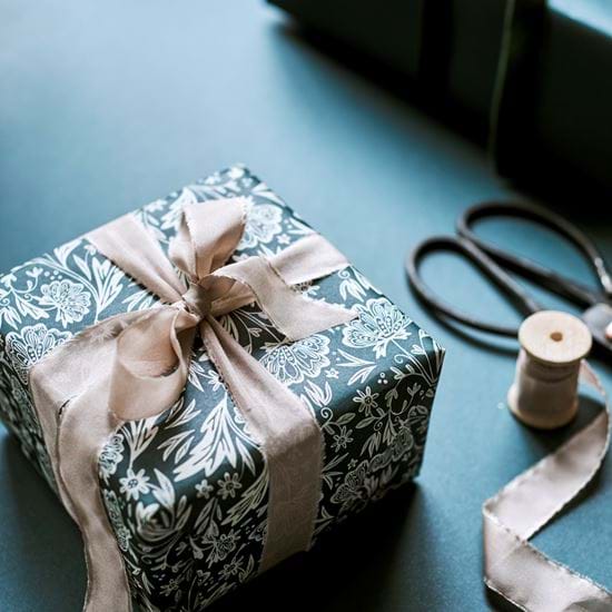 Winterberry wrapped gift with bow